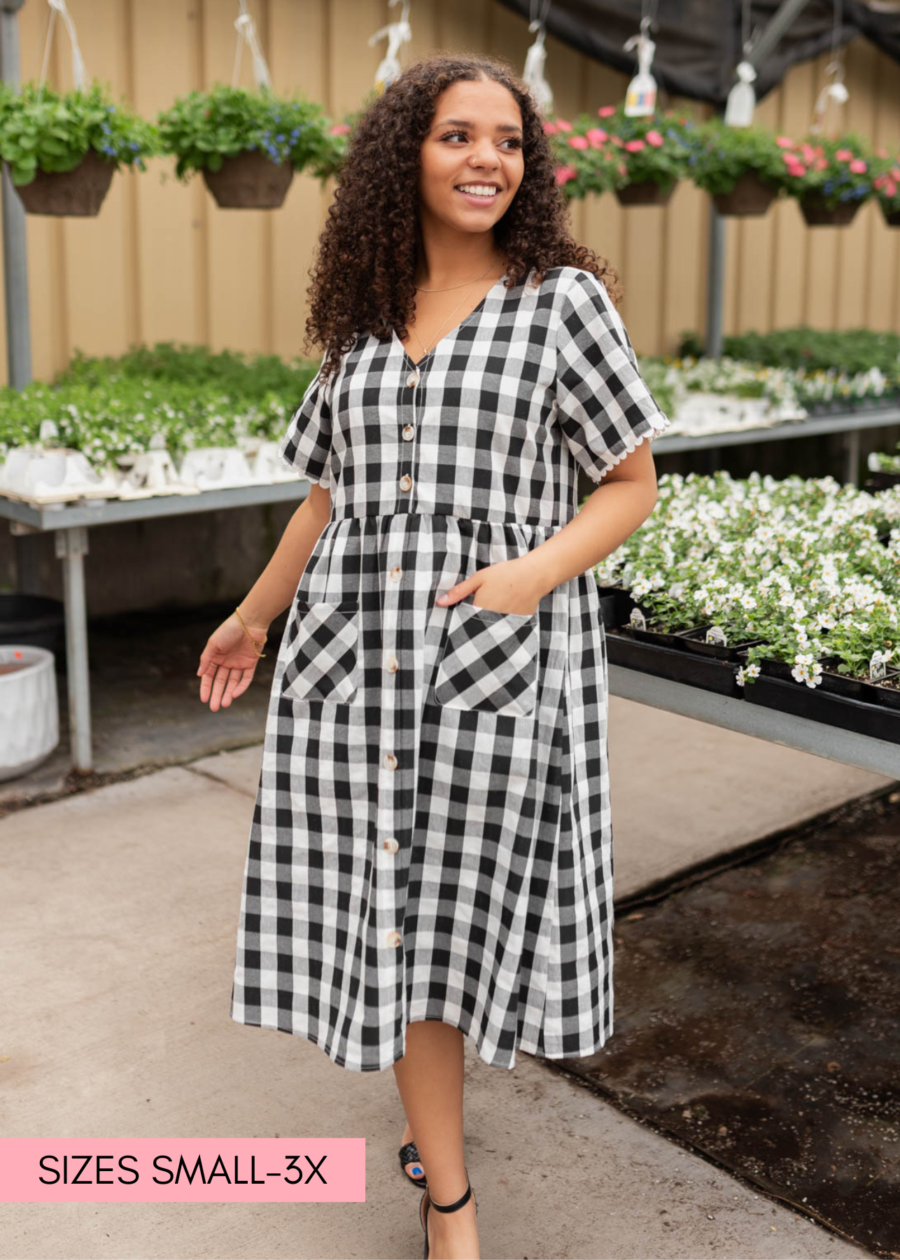 ArelieBlackGinghamButtonDress_8e04e108-a958-468b-adca-17cd5b3a0bbb.png Arelie Black Gingham Button Dress