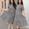 NoraBlueGinghamTieredDress_47b2fd2d-16ef-4afe-a831-1b99a57e141a.png Nora Navy Gingham Tiered Dress