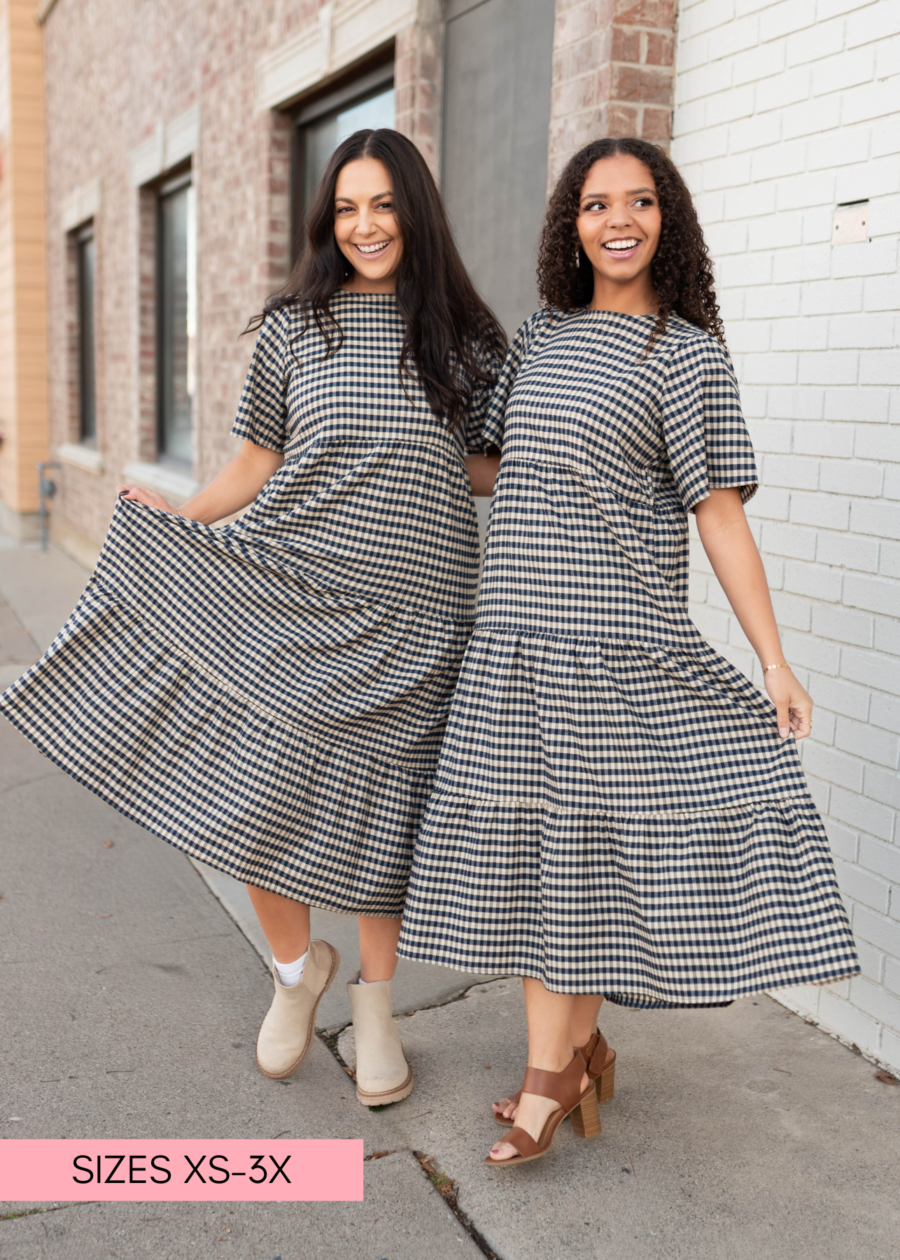 NoraBlueGinghamTieredDress_47b2fd2d-16ef-4afe-a831-1b99a57e141a.png Nora Navy Gingham Tiered Dress