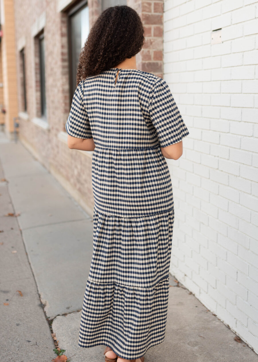 NoraBlueGinghamTieredDress_DSC9850_6462dbba-0d8e-4130-b56b-cb8c6e2bdb49.jpg Nora Navy Gingham Tiered Dress